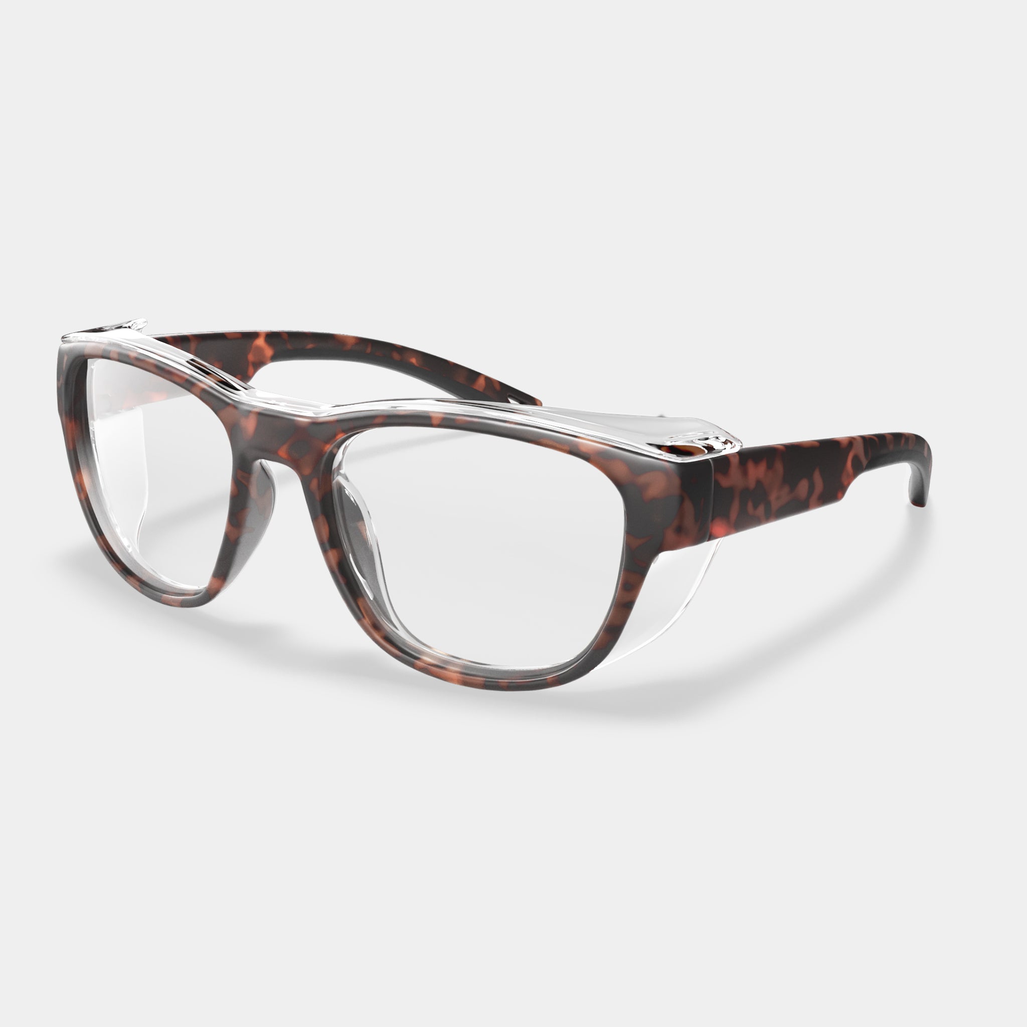 Prescription safety glasses in tortoise shell color with clear side shields on white background