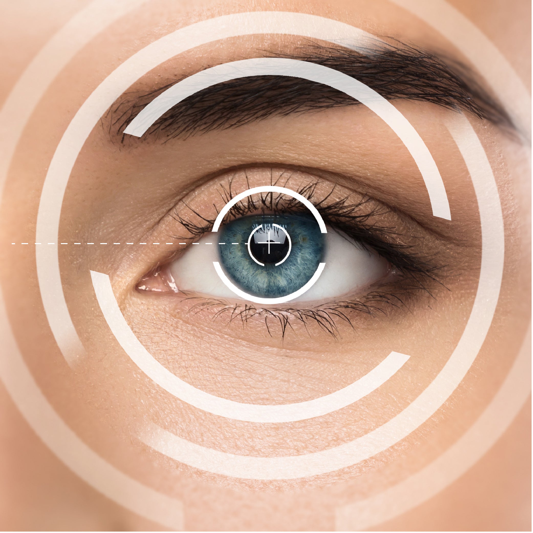 Close-up of a human eye with concentric circles and measurement lines on top of the pupil area