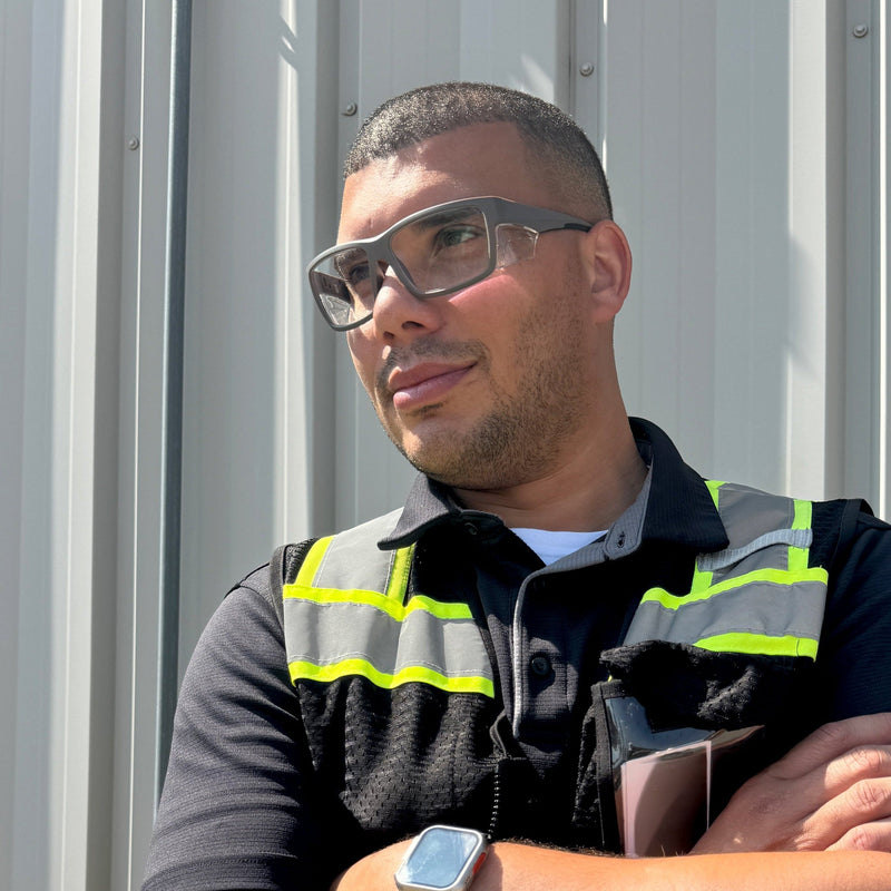 HiDX prescription safety glasses in Matte Black worn by worker outdoors