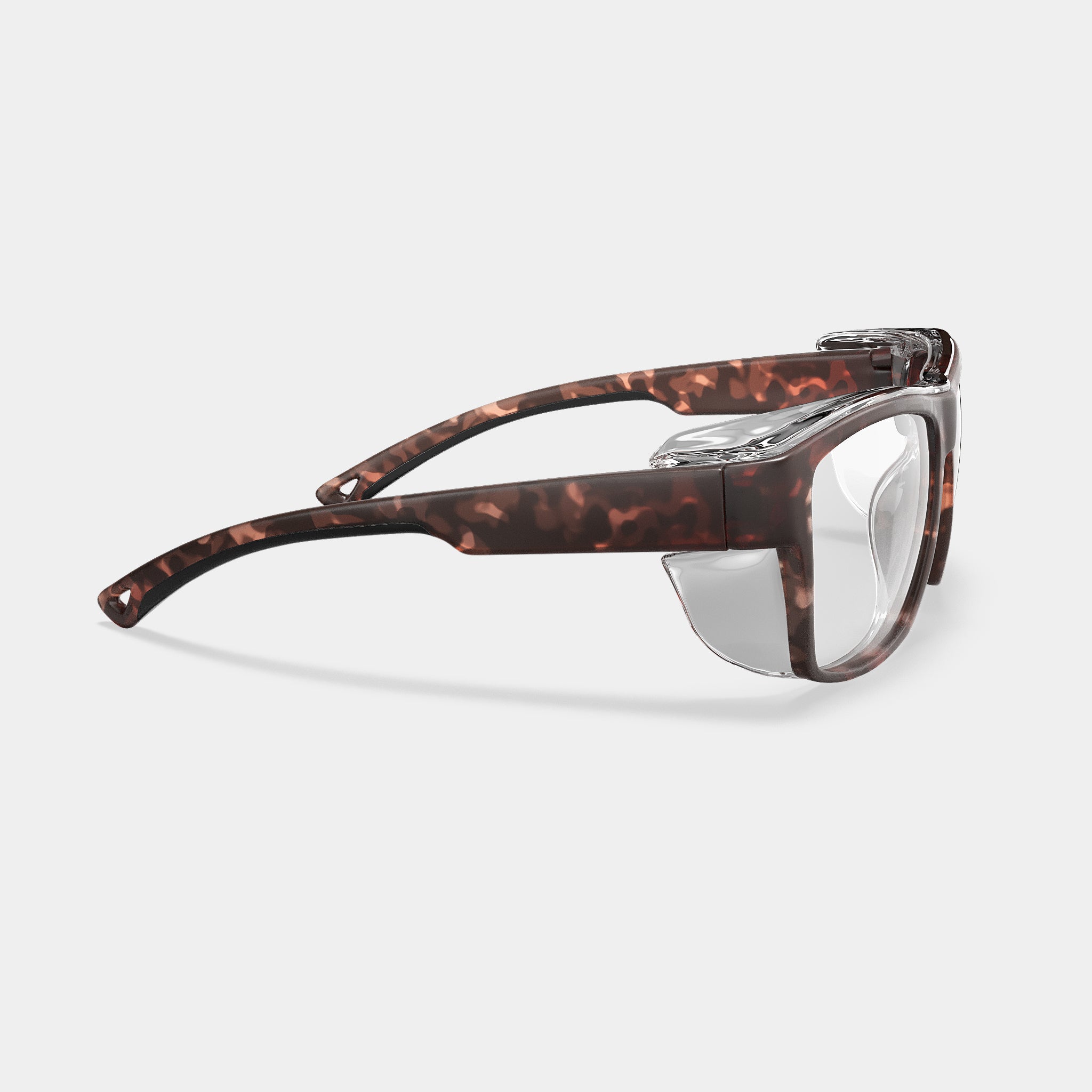 A001 prescription safety glasses in tortoise color, side view with clear side shields