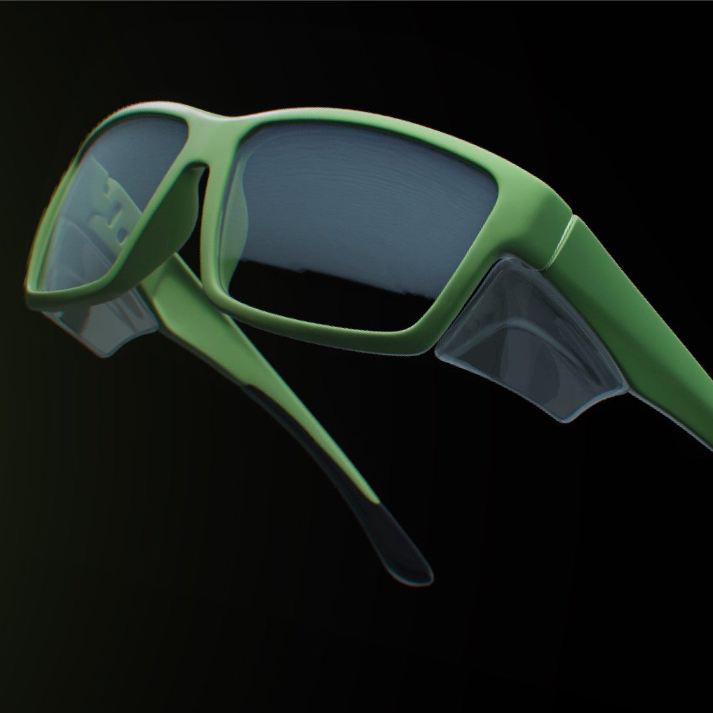 Pair of green prescription safety glasses on a black background