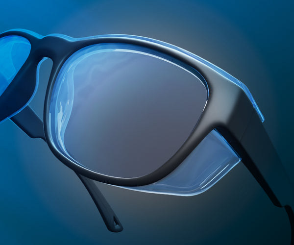 Presription safety glasses with blue reflective lenses on a blue gradient background