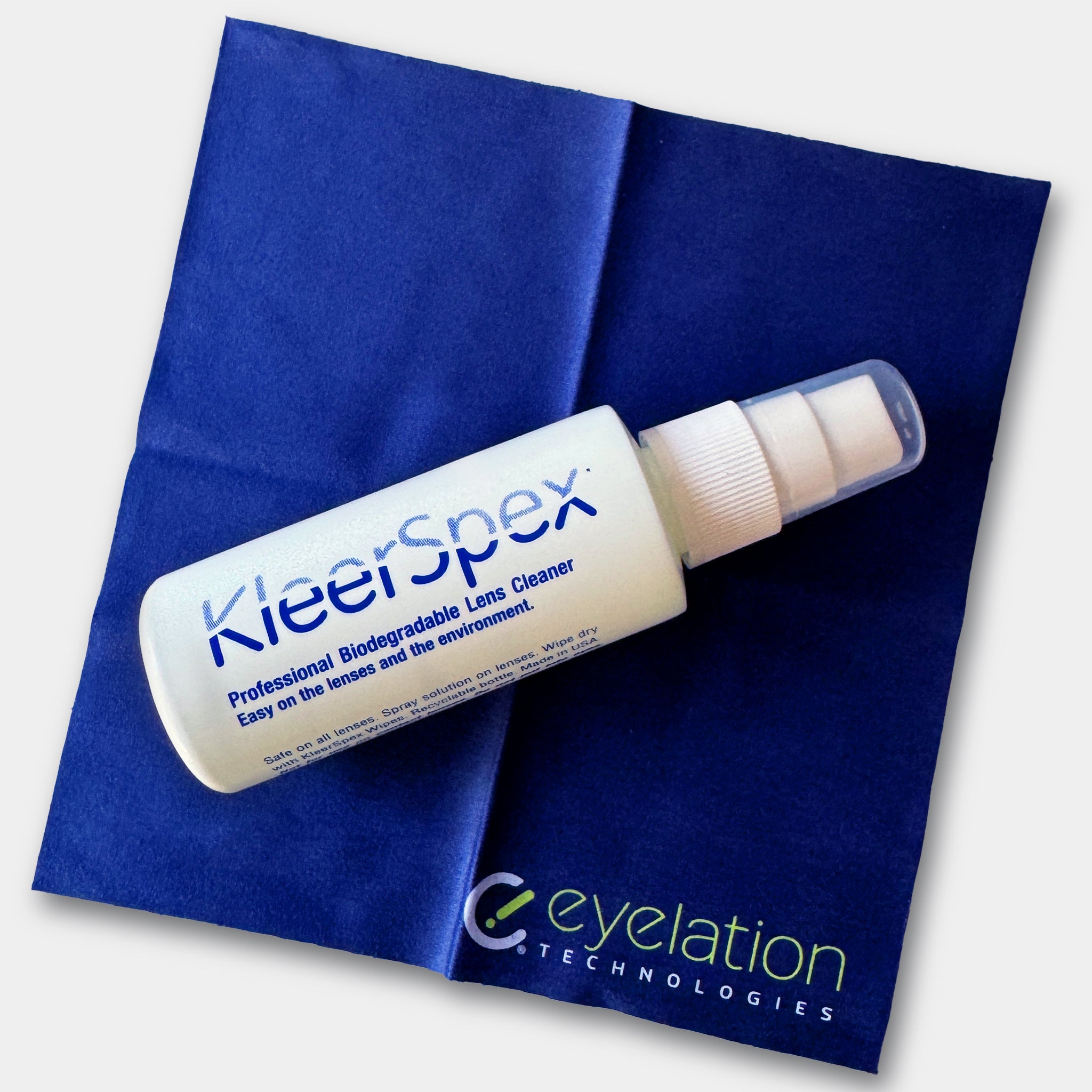 KleerSpex lens cleaner bottle on blue Eyelation Technologies cloth for prescription safety glasses
